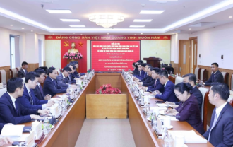 Vietnam, Laos enhance SOE reform cooperation 